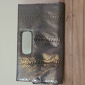 Super cute silver textured clutch